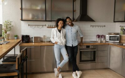 male and female couple standing in kitchen